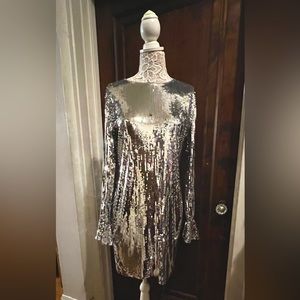 This dress knows how to make an entrance. Michael Kors Sequin dress.